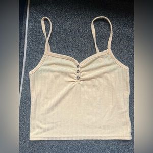 Yellow Tilly’s cropped tank top